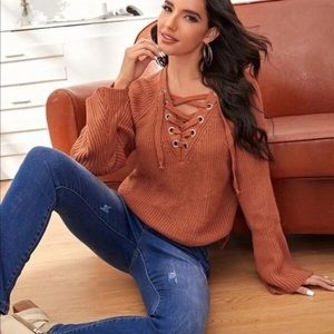 Women lace up neckline sweater